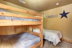 Big Bear Lodge  bedroom with bunks and a twin. 